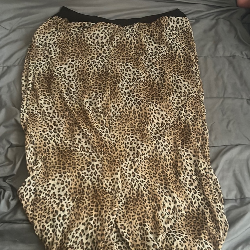 Brown and tan leopard mesh with brown shorts